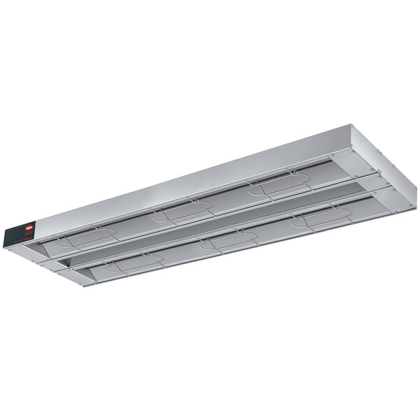 A close-up of a Hatco stainless steel infrared warmer with black and red buttons.