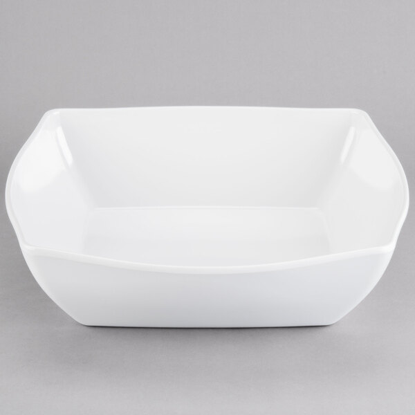 A white square bowl with curved edges.