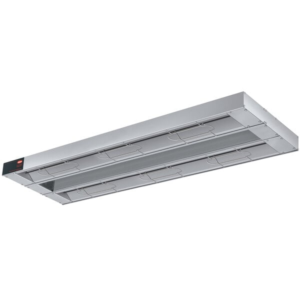 A stainless steel Hatco Glo-Ray dual infrared warmer with a light fixture and red button.