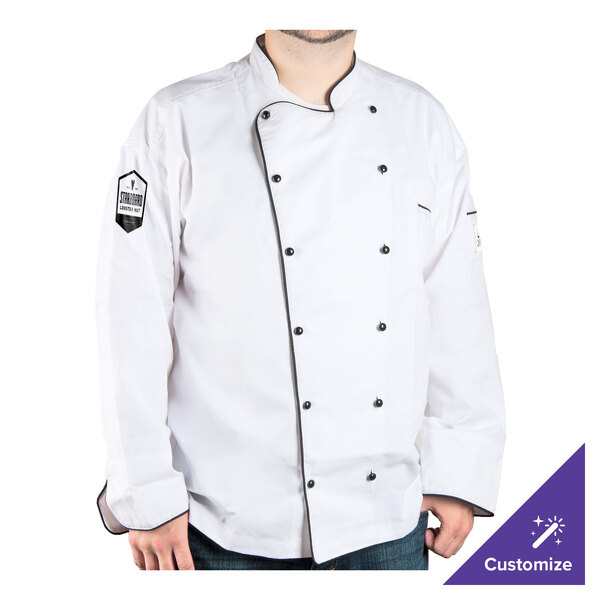 A man wearing a Chef Revival long sleeve chef coat with black piping.