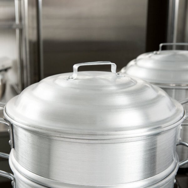 A close-up of a silver pot lid.