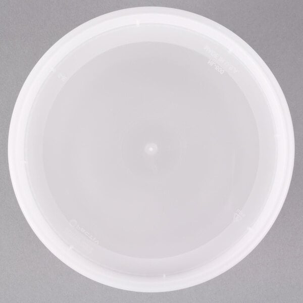 A Pactiv translucent round deli container with a white lid.