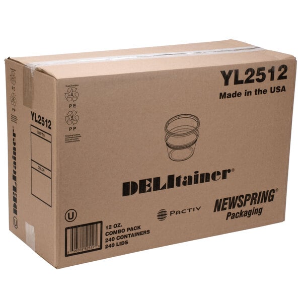 A cardboard box with a deli tray inside.