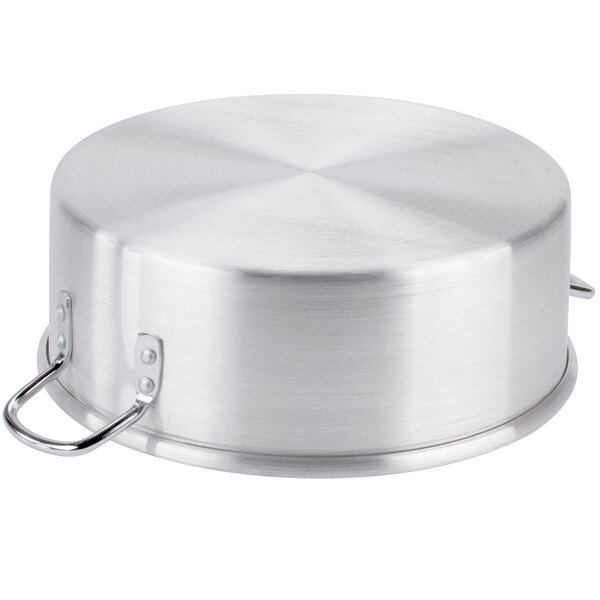 A silver round aluminum Town steamer water pan.