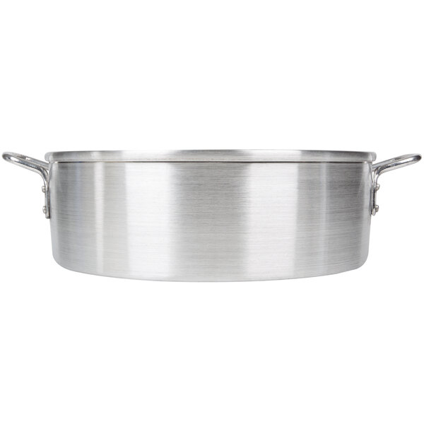 A silver aluminum water pan with two handles.