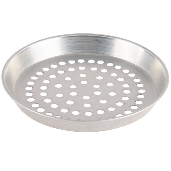 An American Metalcraft silver aluminum pizza pan with holes.