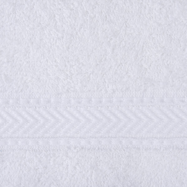 A close up of an Oxford Gold white bath towel with a dobby stripe.