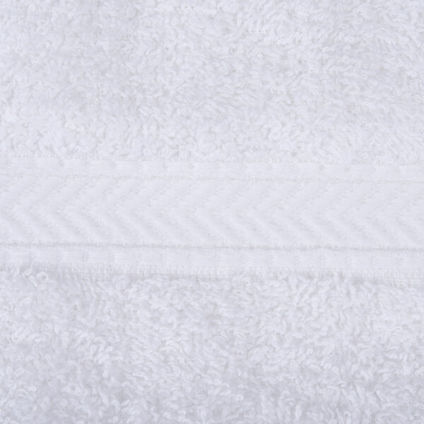 A close up of an Oxford Gold white hand towel with a white stripe.