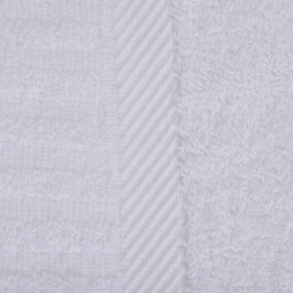 A close up of a white Oxford Signature bath sheet towel with a stripe.