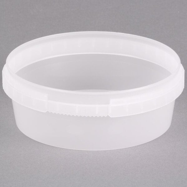 An 8 oz. clear plastic deli container with a tamper evident lid.