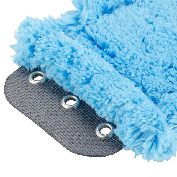 a blue fuzzy object with holes