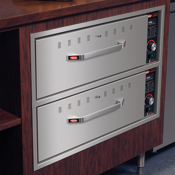 A Hatco built-in two drawer warmer on a counter.
