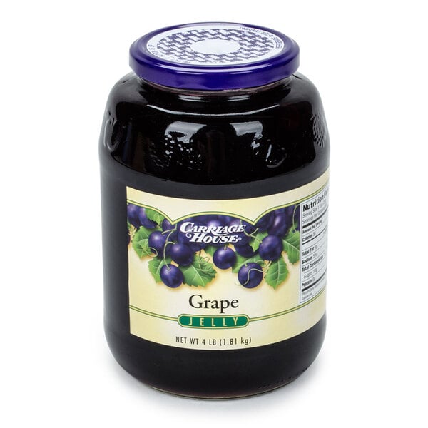 A case of 6 glass jars of grape jelly with a label.