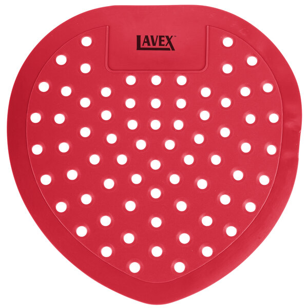 A red heart-shaped urinal screen with holes in it.