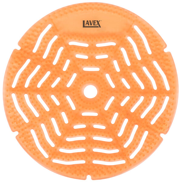 An orange circular Lavex urinal screen with holes in it.