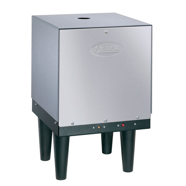 A silver and black Hatco Mini-Compact electric water heater with buttons.
