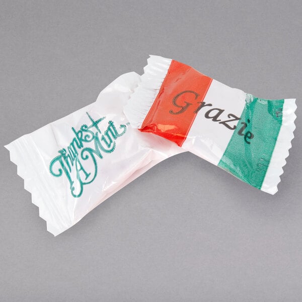 A close up of a clear packet of red peppermint starlite candies.