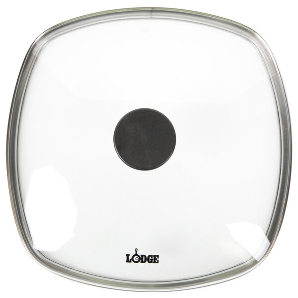 A white square tempered glass cover with a black circle in the center.