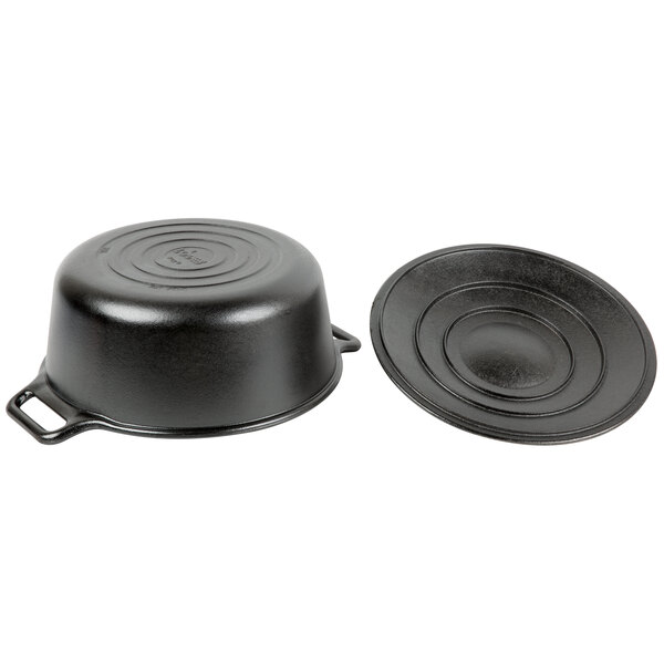 A black Lodge cast iron Dutch oven with a lid.