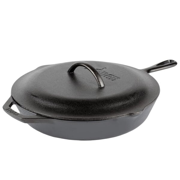 A Lodge cast iron skillet with a lid on it.