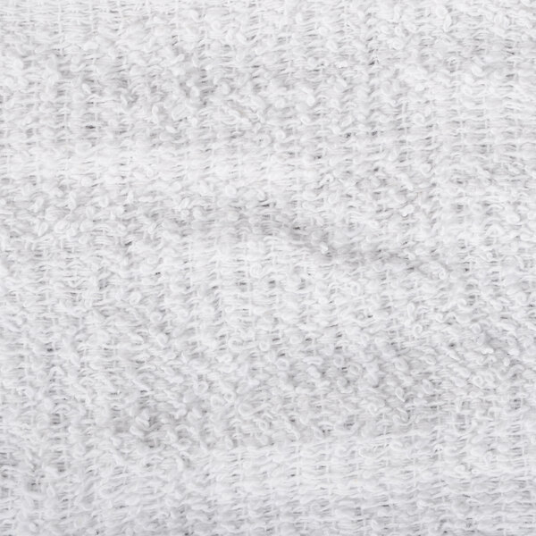 A close up of a white Chef Revival terry bar towel.