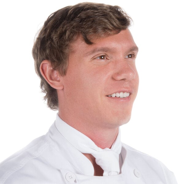A male chef wearing a white Chef Revival neckerchief.
