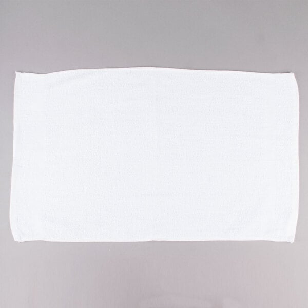 A white Chef Revival bar towel on a gray surface.