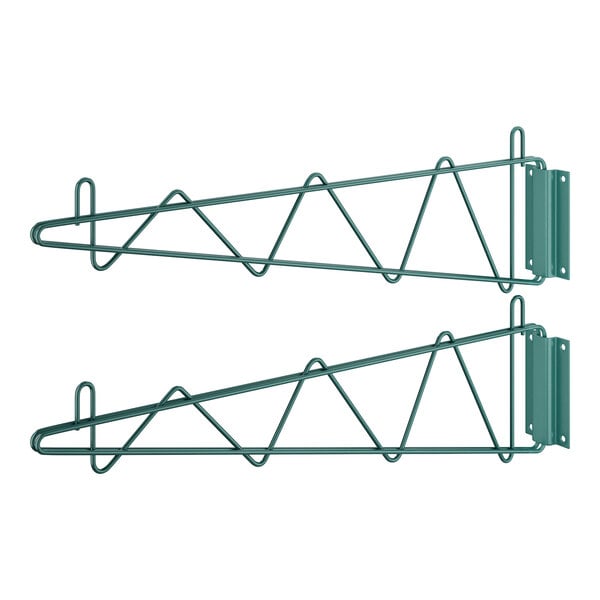 A pair of green metal brackets with hooks on them.