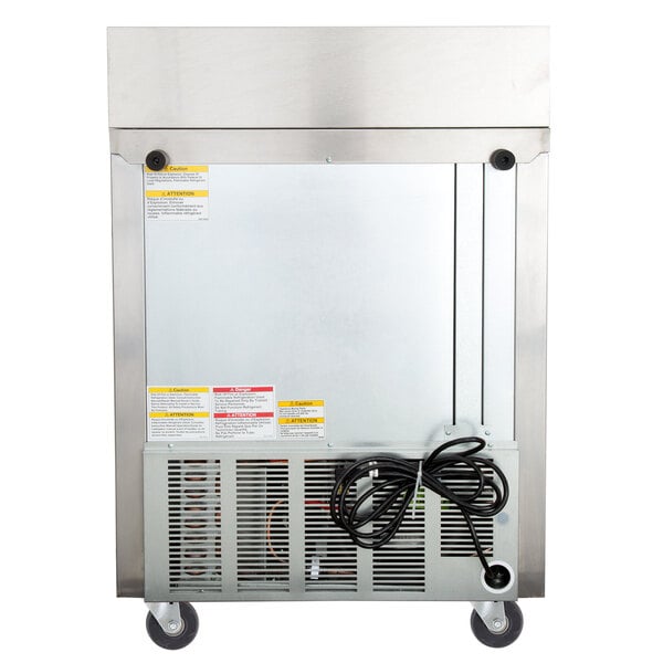 A Beverage-Air stainless steel refrigerator with a close-up of a machine.