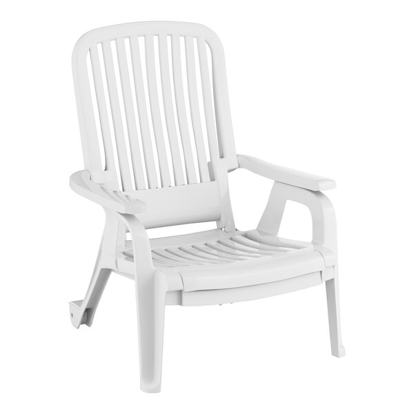A white Grosfillex plastic chaise lounge chair with armrests.