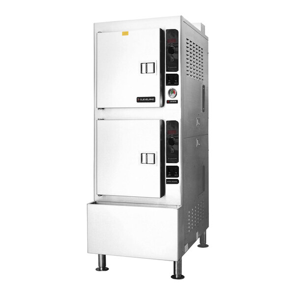 A commercial stainless steel floor convection steamer with two compartments and a boiler base.