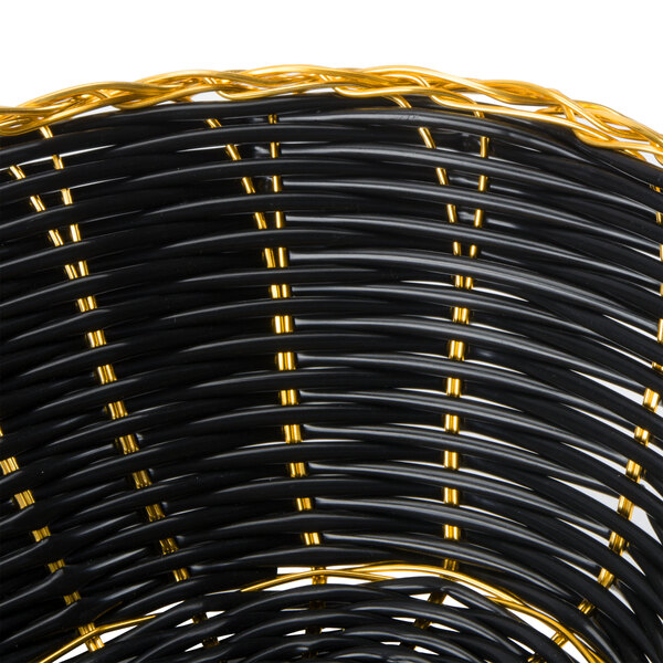 A black and yellow wicker Thunder Group oval basket with a handle.