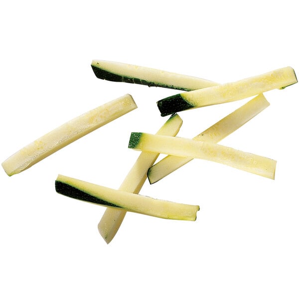 A close-up of zucchini sticks cut with a Robot Coupe 27116 French fry kit.