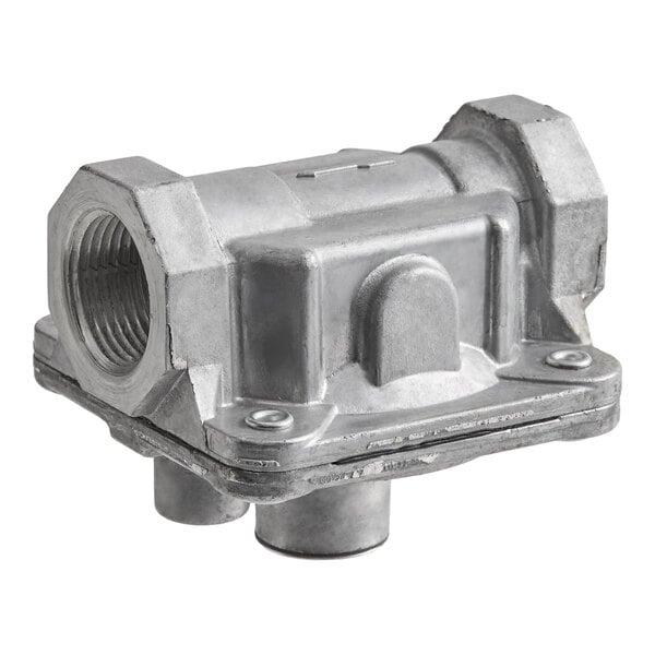 A metallic gas pressure regulator with threaded pipe connections and a rectangular body, featuring two mounting screws and two cylindrical outlets at the base.