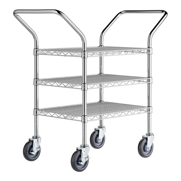 A Regency chrome metal utility cart with three shelves and wheels.