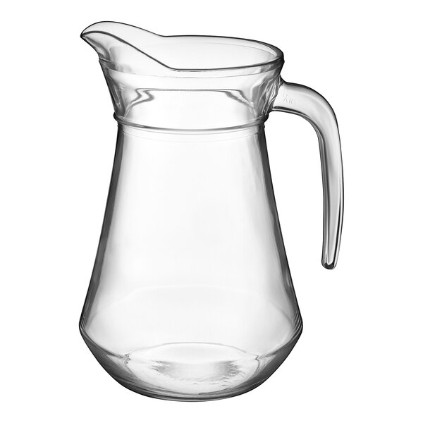 An Arcoroc clear glass pitcher with a handle.