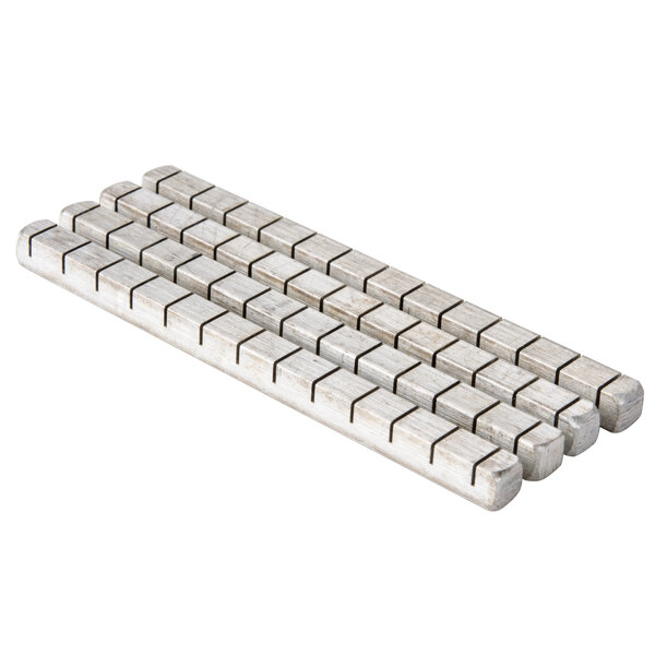 A metal bar with a row of wooden squares on it.
