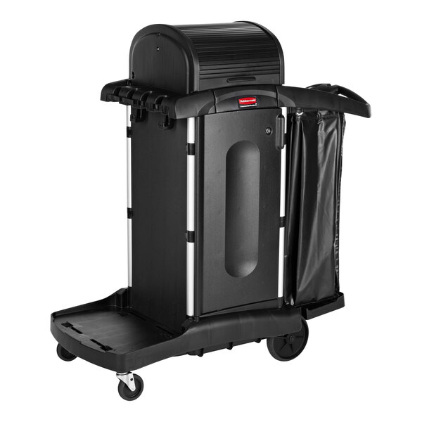 A black Rubbermaid janitor cart with a locking hood, cabinets, and an attached waste bag.
