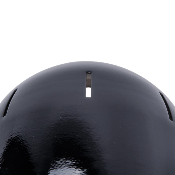 A close-up of a black Nemco bulb warmer hood with a coin slot.