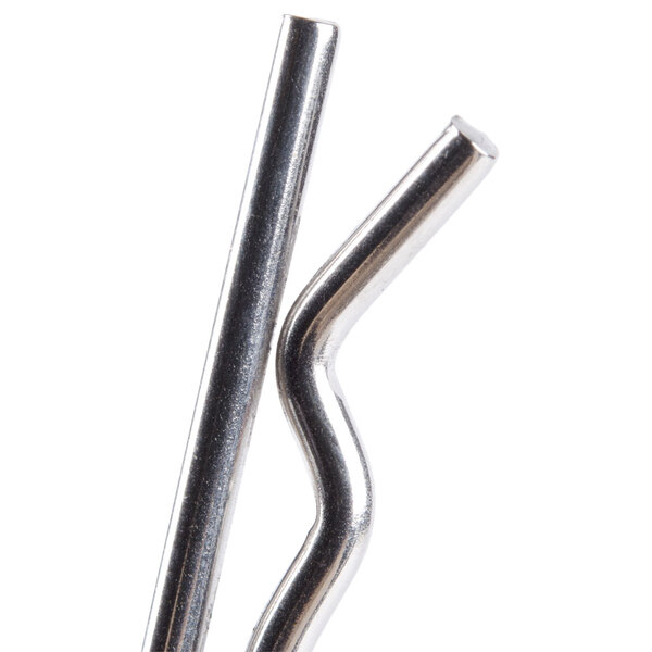 A close-up of a Nemco Hitch Pin Clip, a curved metal rod with a metal tube and metal object.