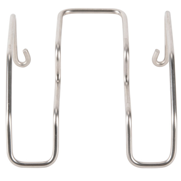 A Robot Coupe wall rack with metal hooks.