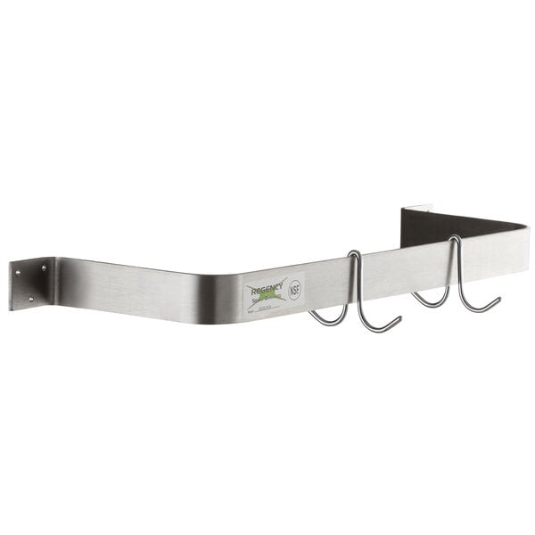 A Regency stainless steel wall mounted pot rack shelf with double prong hooks.