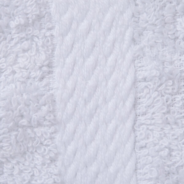 A close up of a white fabric with a dobby border.