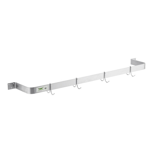 A clear plastic sundae cup filled with soft serve ice cream, topped with whipped cream, chocolate syrup, sprinkles, and a cherry.