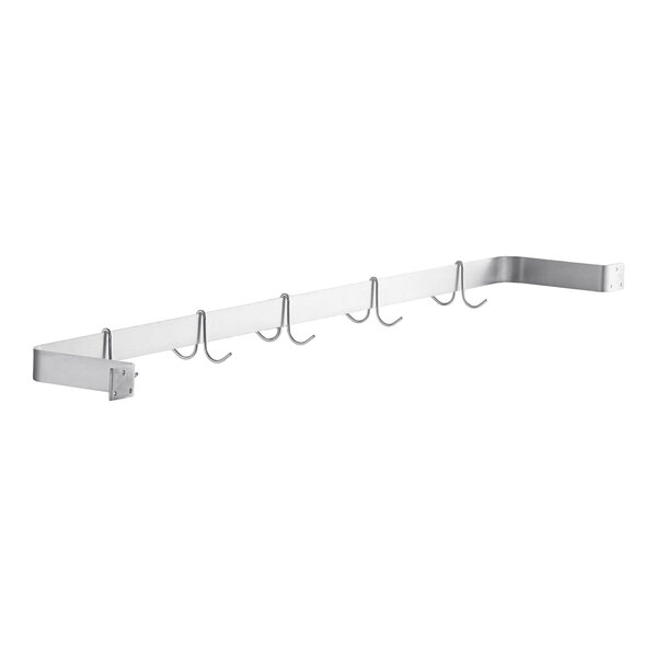 A small glass jar of Dickinson's Pure Pacific Mountain Strawberry Preserves with a black lid and strawberry-themed label.