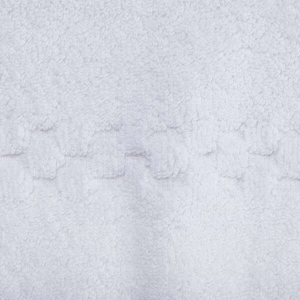 A white towel with a dobby checkered border.