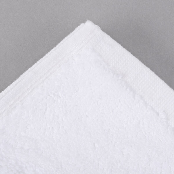 A white Oxford Regale bathmat with a white corner.