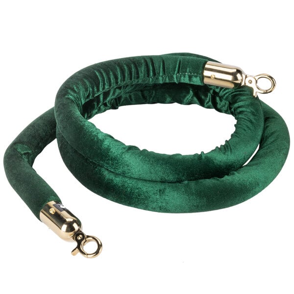 A green velvet rope with brass ends.