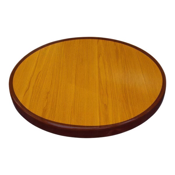 An American Tables & Seating round wooden table top with a dark brown border.