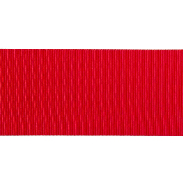 A red ribbon with a rectangular brass wall mount.